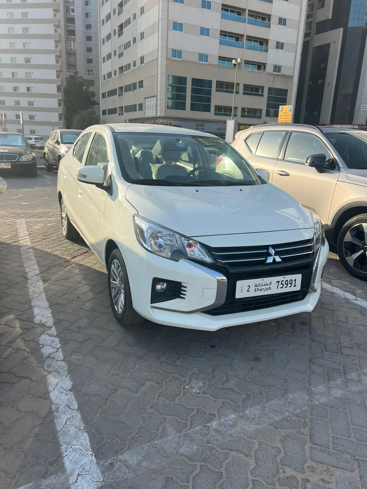 Rent Mitsubishi Attrage in Sharjah Al Majaz - Fuel-Efficient Sedan from 70 AED/day | Noof Rent A Car